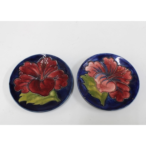 381 - Two Moorcroft Hibiscus dishes, 11.5cm (2)