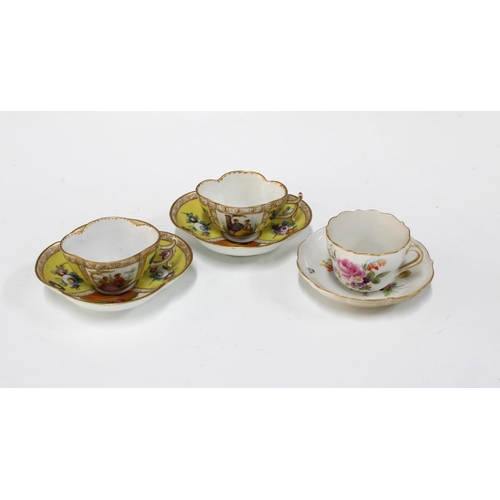 389 - Meissen floral cabinet cup and saucer, together with two scalloped continental cabinet cups and sauc... 