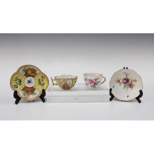 389 - Meissen floral cabinet cup and saucer, together with two scalloped continental cabinet cups and sauc... 