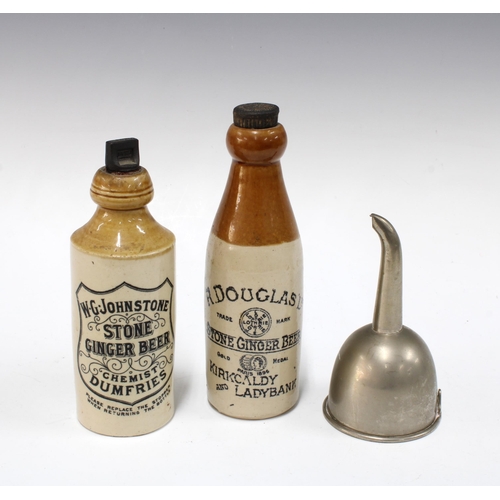 400 - Two stoneware ginger beer bottles, taller 21cm, together with a wine funnel (3)