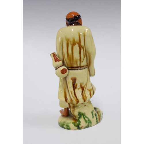 414 - Chinese pottery figure with sancai type glaze, 20cm