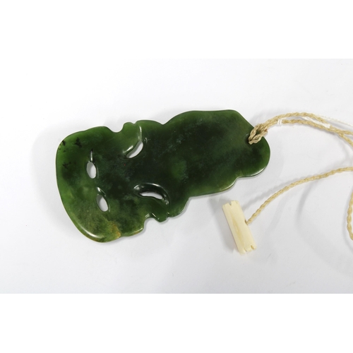 435 - Maori pounamu green stone Hei-Tiki carved pendant with abalone, 9cm