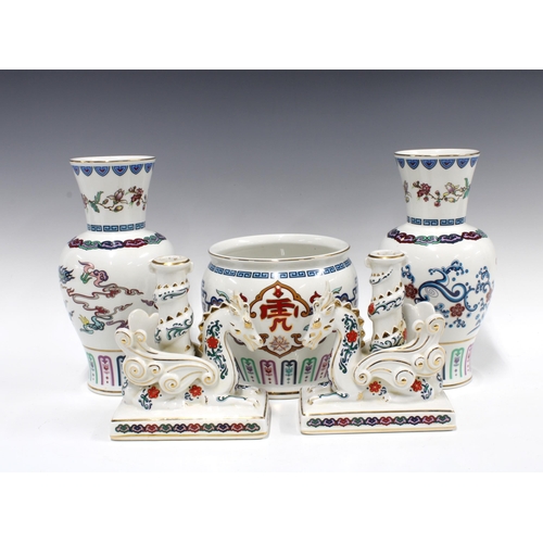 464 - The Dance of the Celestial Dragon group of vases and candlesticks, (5) 26cm