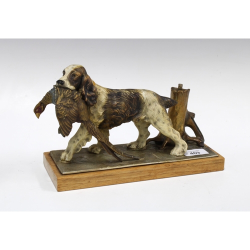 469 - Cold painted spelter spaniel and pheasant on a wooden base, the underside stamped Made In Austria, 2... 