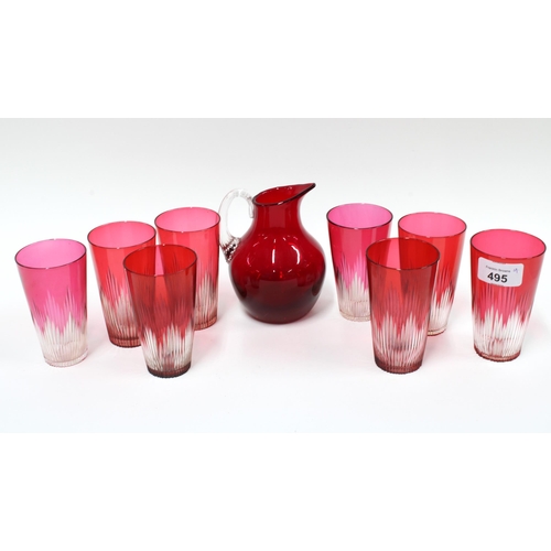 495 - Eight cranberry glass beakers and a cranberry glass jug (9)