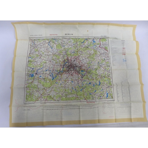 507 - Germany 1953 Cold War silk map and a small coffin tin with gauge / key (2)