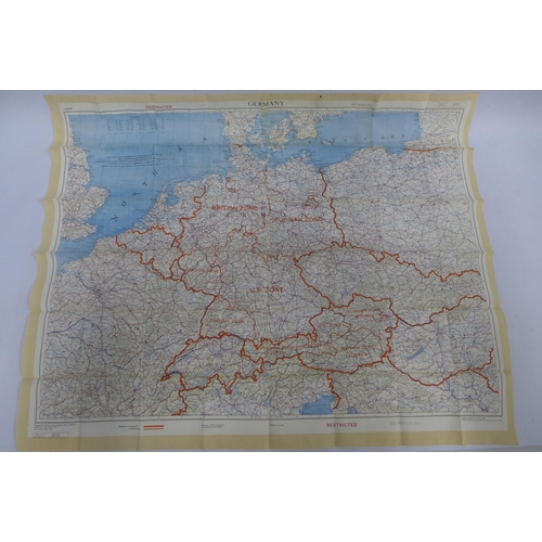 507 - Germany 1953 Cold War silk map and a small coffin tin with gauge / key (2)