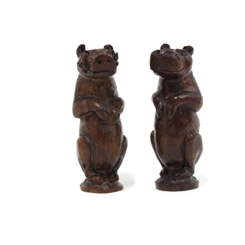 518 - Two carved wooden Hippos , (2) 9cm