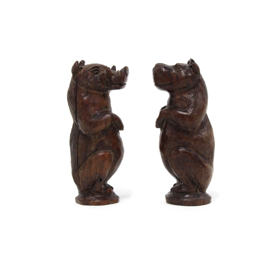 518 - Two carved wooden Hippos , (2) 9cm