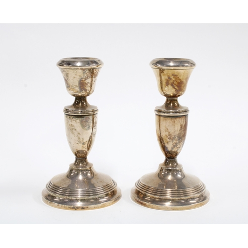 58 - A pair of silver desk candlesticks, Birmingham 1969,  one a/f, 14cm high (2)