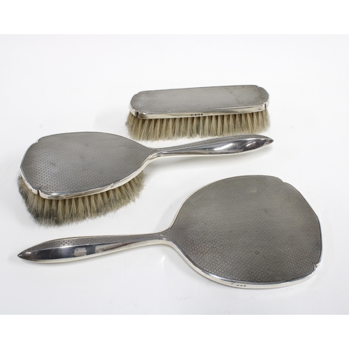 59 - Silver backed dressing table brush set, London 1955 (3)