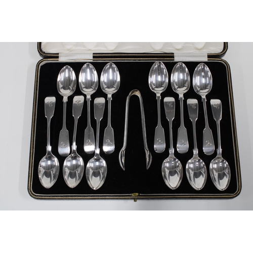 64 - Victorian cased set of twelve silver teaspoons with matching sugar tongs, Sheffield 1894