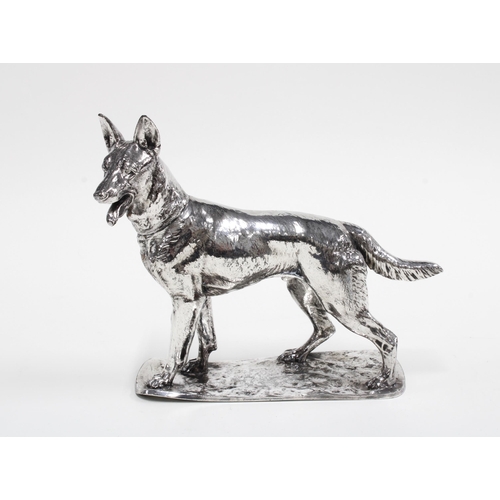 85 - After Fritz Diller, a silver plated German shepherd dog, signed Diller, 15cm high