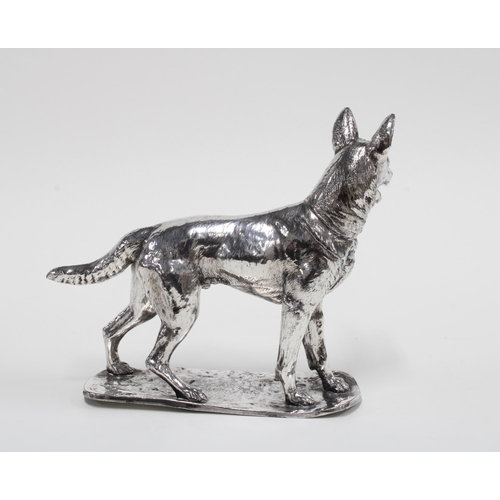 85 - After Fritz Diller, a silver plated German shepherd dog, signed Diller, 15cm high