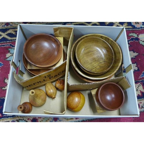 525 - Box containing a quantity of artisan treen, including bowls and miniature vases, etc