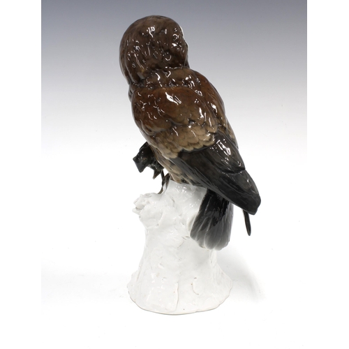 102 - Continental porcelain figure of an owl with mouse on a stump, 31cm