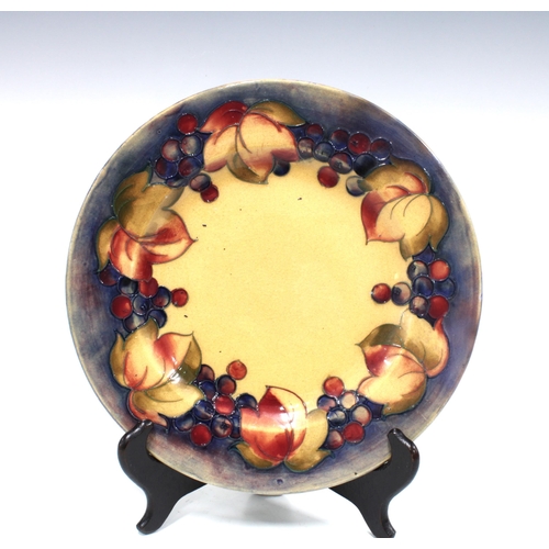 116 - Moorcroft leaf and berry plate, early 20th century, impressed and facsimile marks verso, 24cm