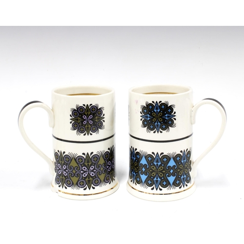 122 - Two Robert Stewart Scottish pottery tankards, 14cm, one with chip out the foot (2)