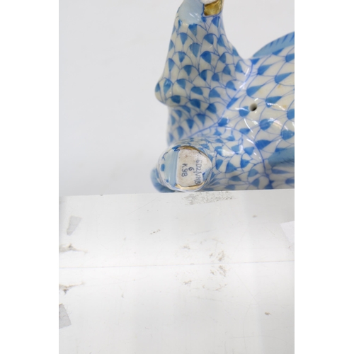 125 - Herend handpainted fishnet blue porcelain cow, printed factory marks and model number 502, 8.5cm