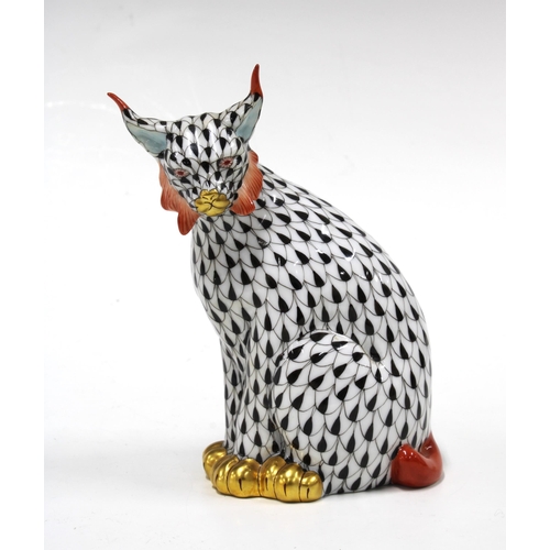 130 - Herend handpainted fishnet porcelain lynx, printed factory marks and model number 15331, 12cm