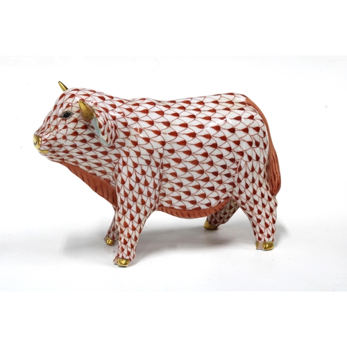 132 - Herend handpainted red fishnet porcelain cow, printed factory marks and model number 5602, 8.5cm