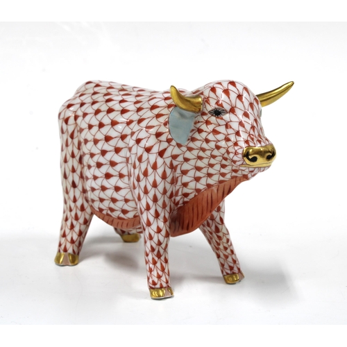 132 - Herend handpainted red fishnet porcelain cow, printed factory marks and model number 5602, 8.5cm