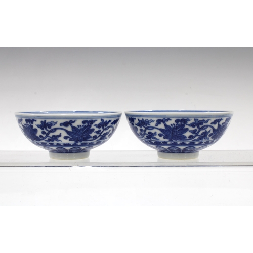 141 - Pair of Chinese blue and white bowls, with Yongzheng marks but likely later, 10 x 4.5cm (2)