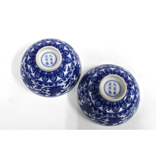 141 - Pair of Chinese blue and white bowls, with Yongzheng marks but likely later, 10 x 4.5cm (2)