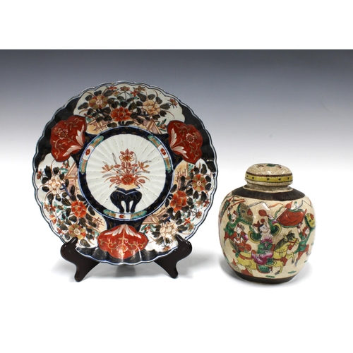 147 - Imari plate 30cm, together with a Chinese ginger jar with the cover fixed in place (2)