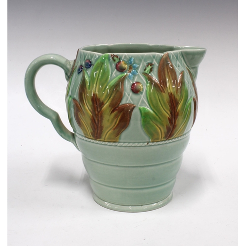 149 - Clarice Cliff Celtic Leaf and Berry pattern jug with a celadon ground, 18cm