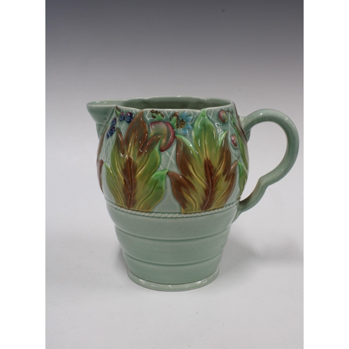 149 - Clarice Cliff Celtic Leaf and Berry pattern jug with a celadon ground, 18cm