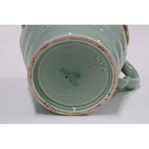 149 - Clarice Cliff Celtic Leaf and Berry pattern jug with a celadon ground, 18cm