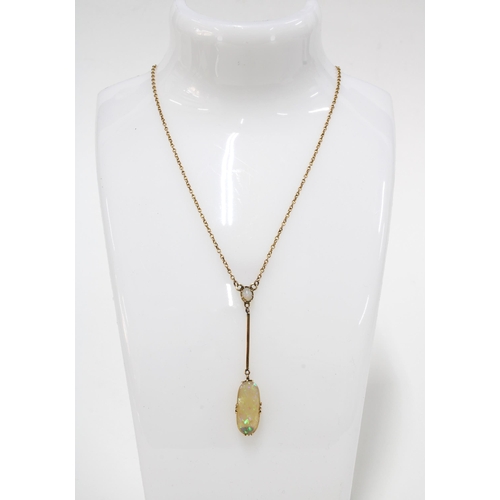 15 - 15ct gold opal pendant necklace, claw set with oval opal, suspending a larger opal  from a knife bar... 