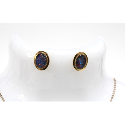 19 - An opal pendant necklace on a 9ct gold chain and a pair of opal earrings (2)