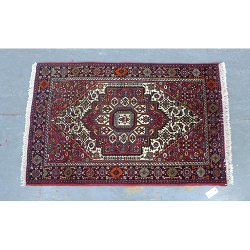 204 - Persian Gholtogh  / Goltok  with rug red field  and central lozenge, 117 x 75cm