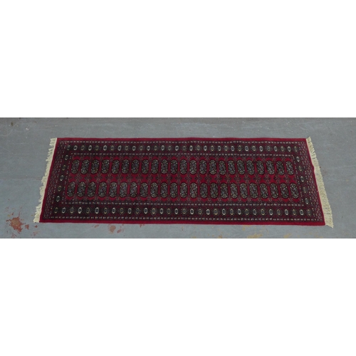 207 - Pakistani bokhara runner with red field 244 x 82cm