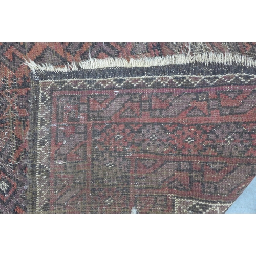 208 - Belouch rug with worn field, (a/f) 200x 121cm