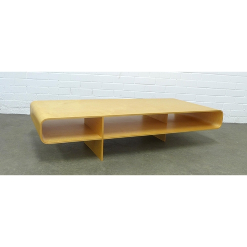 219 - An Isokon Loop coffee table designed by Barber Osgerby, in birch ply, 134 x 30 x 60cm