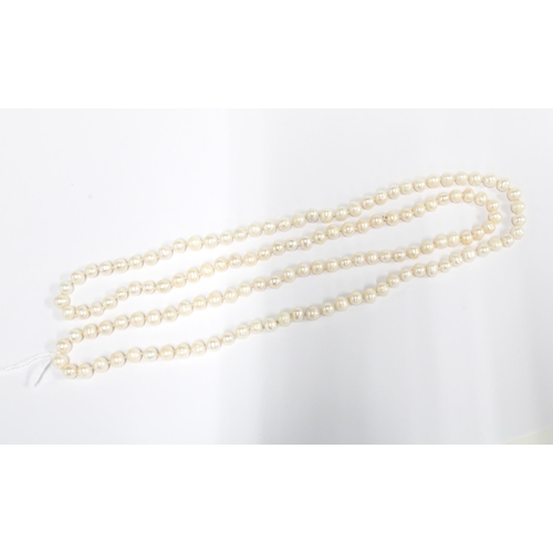 22 - An opera length strand of cultured pearls