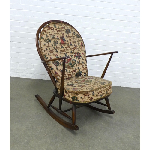 222 - Ercol dark elm rocking chair with removable cushions,  75 x 44cm.