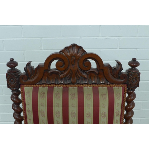 225 - A mahogany open armchair with scrolling toprail and barley twist and bobbin supports, striped uphols... 