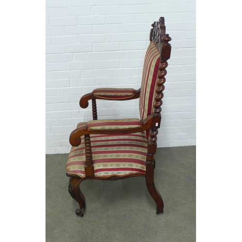 225 - A mahogany open armchair with scrolling toprail and barley twist and bobbin supports, striped uphols... 