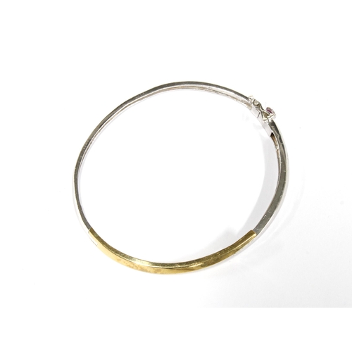 23 - 9ct yellow and white gold diamond set bangle, stamped 375