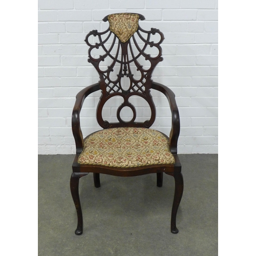 234 - Mahogany open armchair with art nouveau pierced back, 58 x 108 x 51cm.