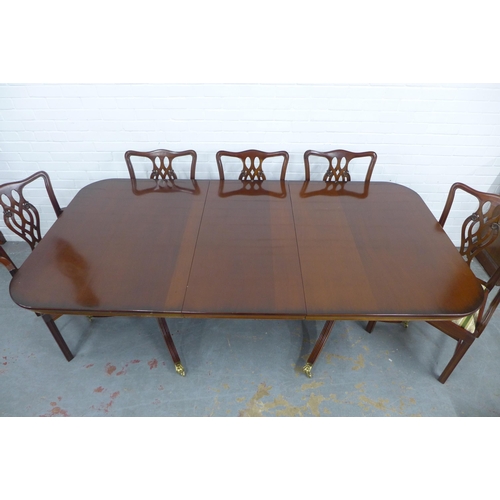 250 - Georgian style mahogany twin pedestal dining table and set of eight chairs, 213 x 75 x 112cm. (9)