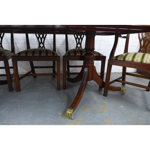 250 - Georgian style mahogany twin pedestal dining table and set of eight chairs, 213 x 75 x 112cm. (9)