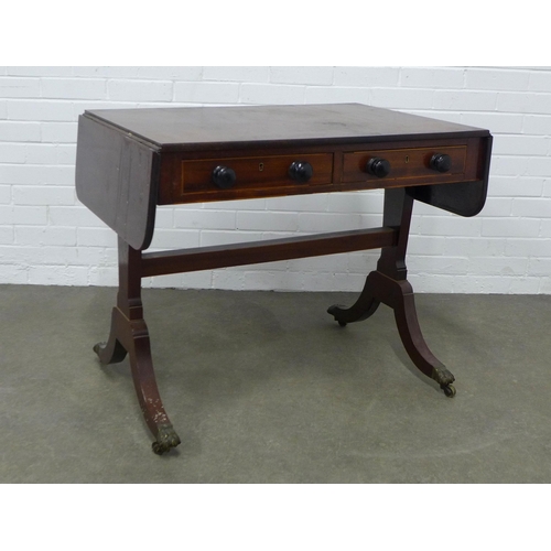 256 - Mahogany sofa table, two drawers with bun handles,  90 x 73 x 61cm.