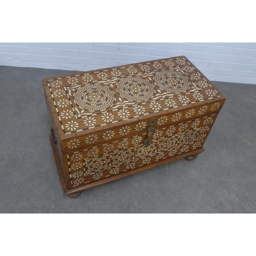 259 - An Anglo Indian bone inlaid storage box, void interior  and a brass clasp fastening, 96 x 59 x 47cm.