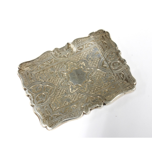 26 - Victorian silver card case with an allover engraved foliate pattern and vacant cartouche, 10 x 7cm