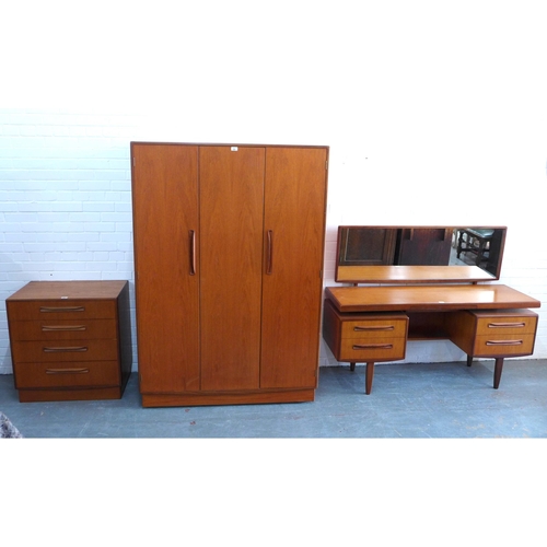 268 - G-Plan vintage teak bedroom suite comprising a wardrobe,  122 x 77 x 58cm, chest of drawers (a/f) an... 